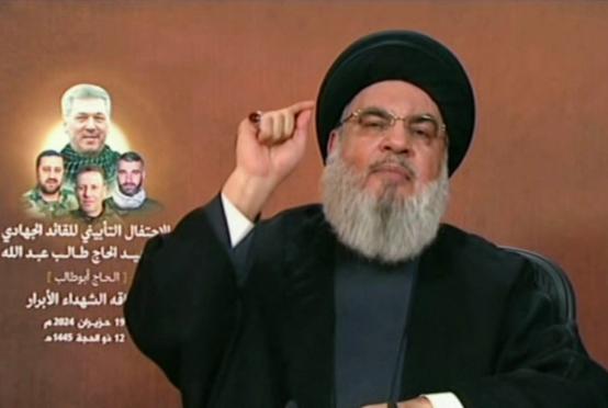 ဟစ်ဇဘိုလာအကြီးအကဲ ရုပ်သံမိန့်ခွန်းပြောကြားနေပုံကို ဇွန် ၁၉ ရက်တွင်တွေ့ရစဉ်(Photo:Reuters)
