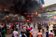 ဇူလိုင် ၁၈ ရက်က ဒါကာမြို့တော်တွင် ဆန္ဒပြသူများနှင့် ရဲတပ်ဖွဲ့အကြား ခိုက်ရန်ဖြစ်ပွားနေစဉ်(Photo: AFP)