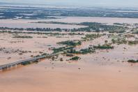 ရေကြီးနေသည့် ပေါ်တိုအယ်လီဂရီမြို့ကို မေ ၅ ရက်က ရိုက်ထားသောပုံတွင်တွေ့ရစဉ်(Photo: AFP)