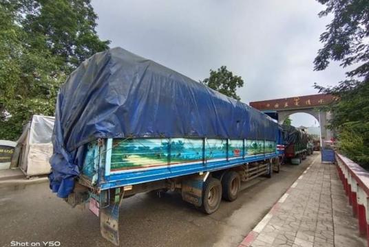 ချင်းရွှေဟော် နယ်စပ်ကုန်သွယ်ရေးဂိတ် စတင်စမ်းသပ်ဖွင့်လှစ်သည့် နိုဝင်ဘာ ၂၆ ရက်က မြင်ကွင်း (ဓာတ်ပုံ-ပြည့်စုံ)
