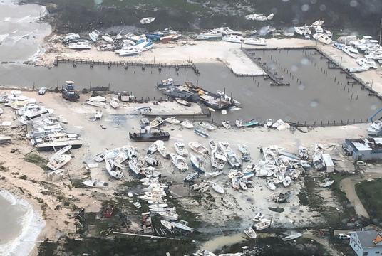 ဟာရီကိန်း ဒိုရီယန်ကြောင့် စက်တင်ဘာ ၂ ရက်တွင် ဘဟားမား၌ ပျက်စီးနေမှုကို တွေ့ရစဉ် (Photo : AFP)