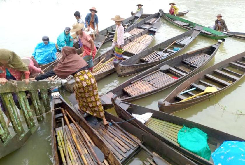 လေးမျက်နှာမြို့တွင် ရေကြီးရေလျှံမှုဖြစ်ပွားနေသည်ကို တွေ့ရစဉ်