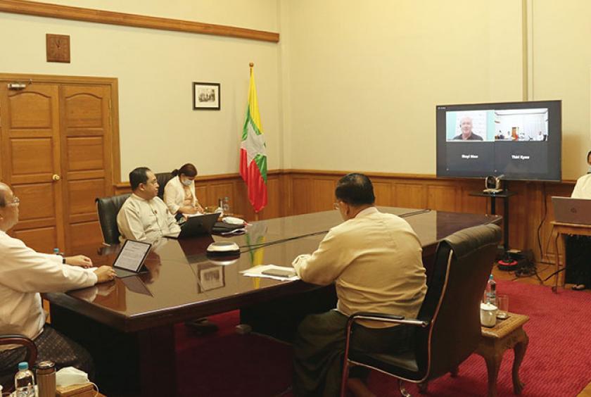 ပြည်ထောင်စုဝန်ကြီး ဦးသောင်းထွန်း၊ ဒုတိယဝန်ကြီးဦးဆက်အောင်၊ ဦးဗရတ်ဆင်းတို့ Video Conferencing စနစ်ဖြင့် ပါဝင်ဆွေးနွေးစဉ်  (ဓာတ်ပုံ- MIFER)