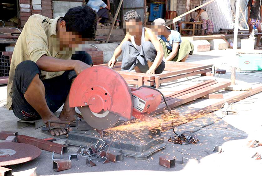 ရန်ကုန်မြို့ရှိ စက်မှုလက်မှုလုပ်ငန်းခွင်တစ်ခုကို ယခင်နှစ်က တွေ့ရစဉ်